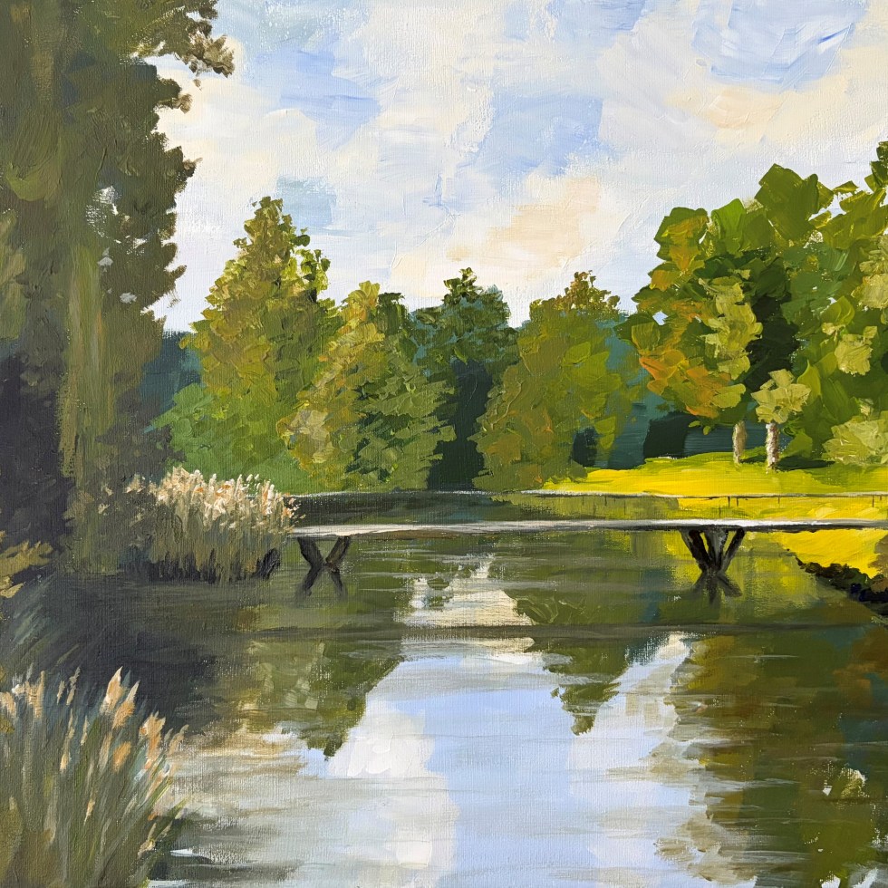 Impressionistic landscape painting of a small footbridge crossing a narrow waterway in a lush green setting. Sunlit grass and trees are reflected in the calm water beneath the bridge.
