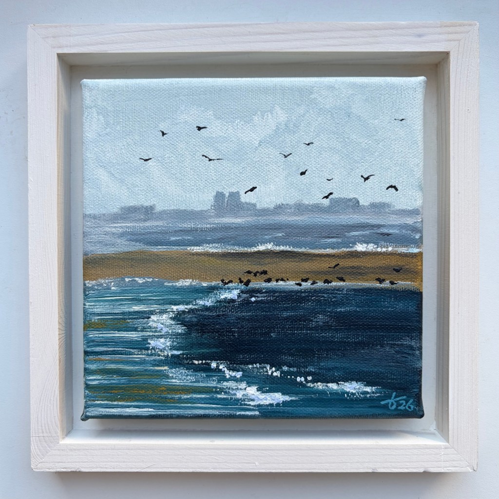 Miniature acrylic painting of blue coastal waters, a narrow sandbank and birds flying and resting, presented in a white wooden floating frame.